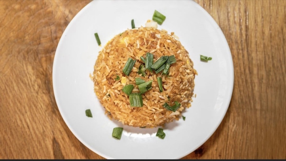A plate of the kitchen's house breakfast rice.